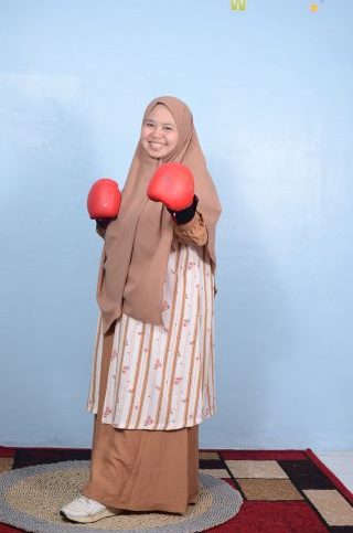 Nini Kartini, S.Pd.I.